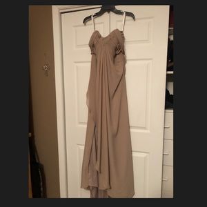 Brand new women’s gown with tickets still on